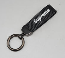 Load image into Gallery viewer, BRAND NEW SUPREME BLACK PENDANT WITH CALF LEATHER KEYCHAIN KEY RING TAG