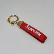 Load image into Gallery viewer, BRAND NEW SUPREME RED PENDANT WITH CALF LEATHER KEYCHAIN KEY RING TAG